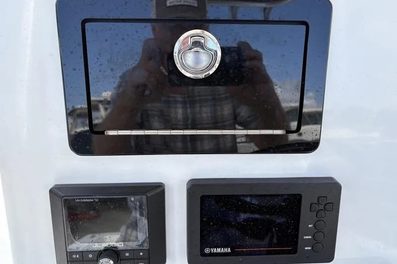 Slide: The Image of Control panel of 2020 Islamorada 24 Morada boat with Yamaha and JL Audio displays. - 15