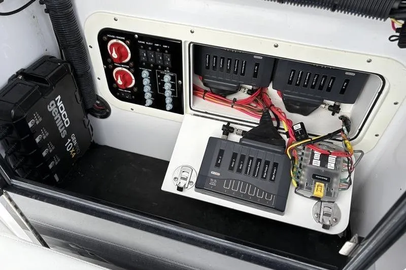 Slide: The Image of Electrical panel of 2020 Islamorada 24 Morada boat with wiring and switches. - 21