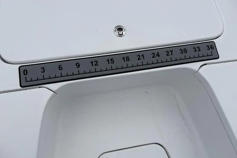 Slide: The Image of Ruler on 2020 Islamorada 24 Morada boat deck, measuring up to 36 inches. - 27