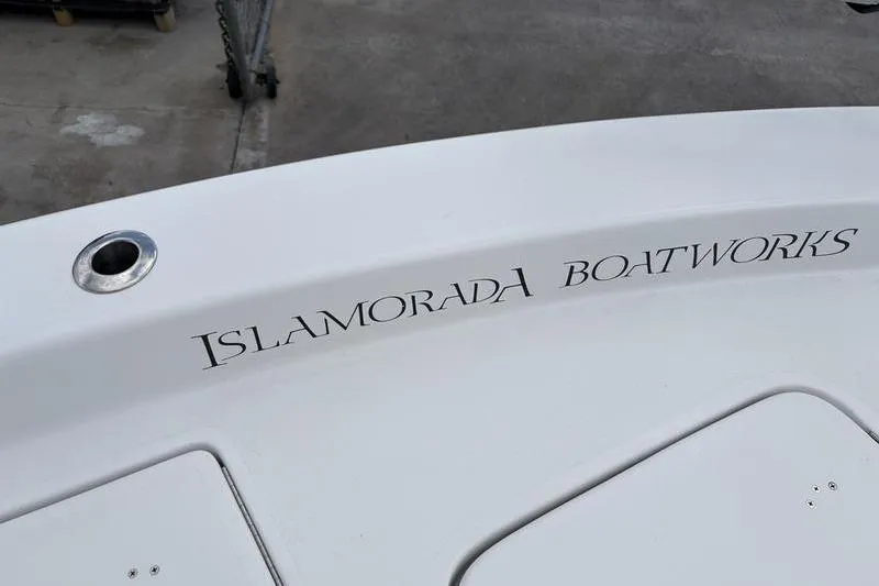 Slide: The Image of 2020 Islamorada 24 Morada boat with "Islamorada Boatworks" branding on deck. - 28