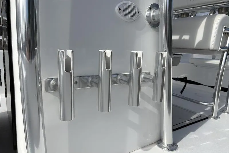Slide: The Image of Rod holders on a 2020 Islamorada 24 Morada boat, featuring sleek metallic design. - 8