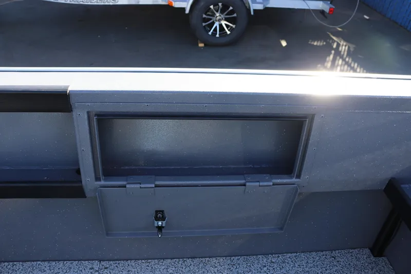 Slide: The Image of 2026 Alumaweld Super Vee 20 boat interior storage compartment with lockable hatch. - 15