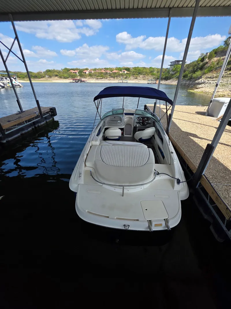Slide: The Image of 2003 Monterey 208SI Montura boat docked, sunny day. - 18