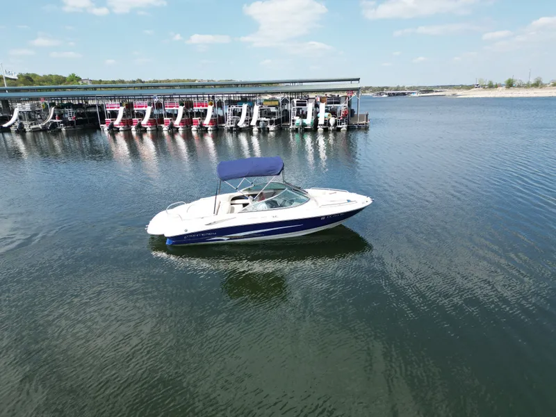 Slide: The Image of 2003 Monterey 208SI Montura boat on calm water. - 19