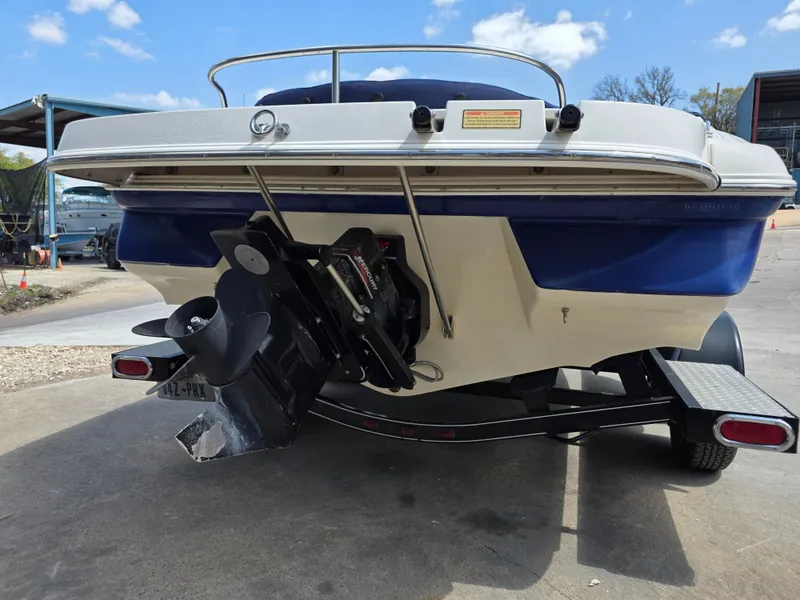 Slide: The Image of Rear view of a 2003 Monterey 208SI Montura boat on a trailer. - 3