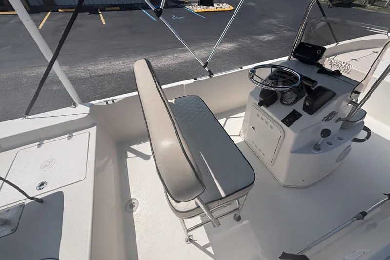 Slide: The Image of 2020 Carolina Skiff 192 JLS boat interior with steering console and seating. - 12
