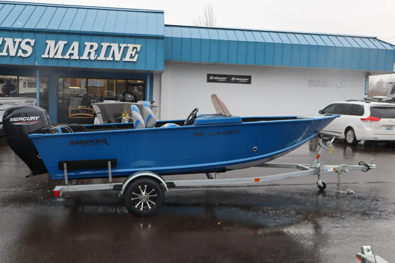 The Image of 2026 Smoker Craft Lazer 161 boat on trailer outside dealership. - 0