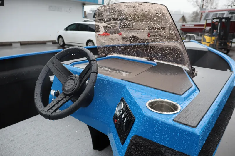 Slide: The Image of 2026 Smoker Craft Lazer 161 boat with wet steering wheel and dashboard. - 10
