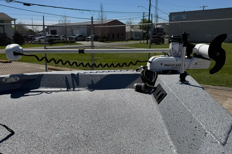 Slide: The Image of 2015 Xpress H22B Bay boat with Minn Kota trolling motor on deck. - 7