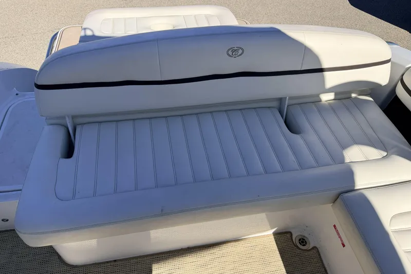Slide: The Image of 2016 Cobalt R7 boat with white cushioned seating and elegant design. - 19