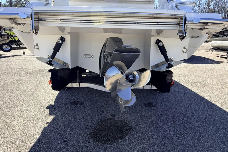 Slide: The Image of Rear view of a 2016 Cobalt R7 boat showing the propeller and outdrive. - 24