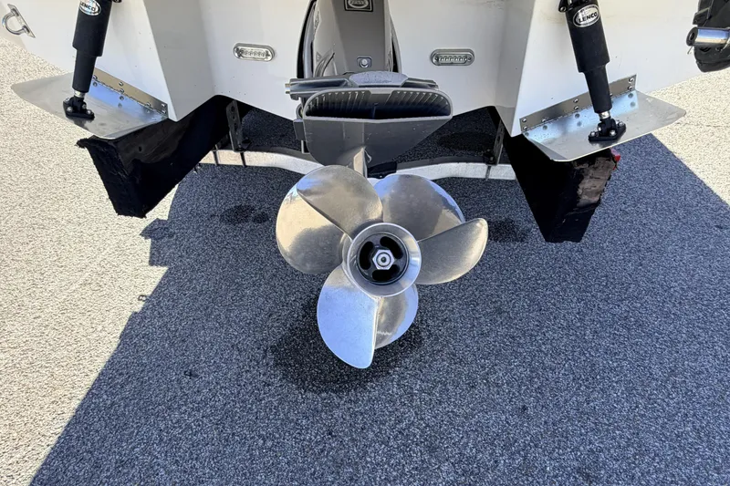 Slide: The Image of Rear view of a 2016 Cobalt R7 boat with a shiny propeller. - 25