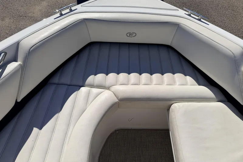 Slide: The Image of 2016 Cobalt R7 boat interior with white cushioned seating. - 6