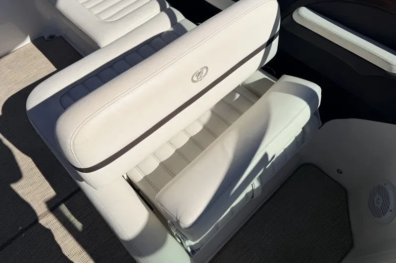 Slide: The Image of White leather seating in a 2016 Cobalt R7 boat, showcasing luxury and comfort. - 9
