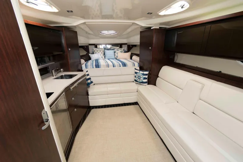 Slide: The Image of Luxurious interior of 2015 Monterey 355 Sport Yacht with plush seating and modern amenities. - 9