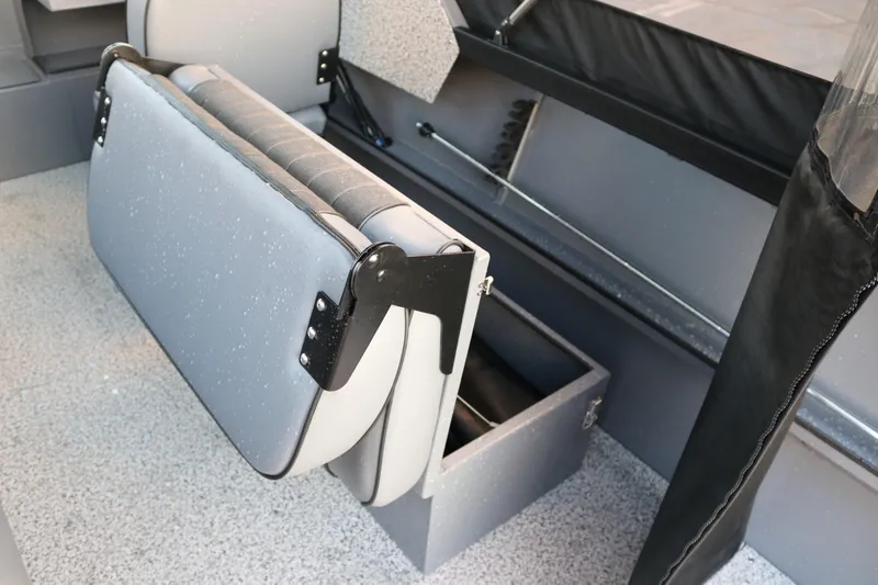 Slide: The Image of 2026 Alumaweld Stryker 202 boat interior with foldable seat and storage compartment. - 19