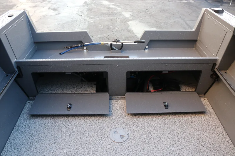 Slide: The Image of 2026 Alumaweld Stryker 202 boat interior with open storage compartments. - 23