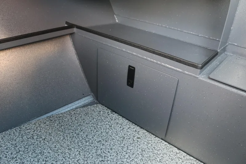 Slide: The Image of Interior view of 2026 Alumaweld Stryker 202 boat, featuring storage compartment. - 28