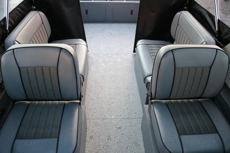Slide: The Image of Interior seating of 2026 Alumaweld Stryker 202 boat, featuring gray upholstered seats. - 34