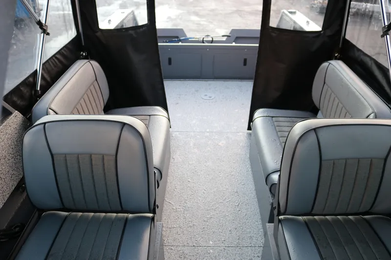 Slide: The Image of Interior of 2026 Alumaweld Stryker 202 boat with gray seating and spacious layout. - 35