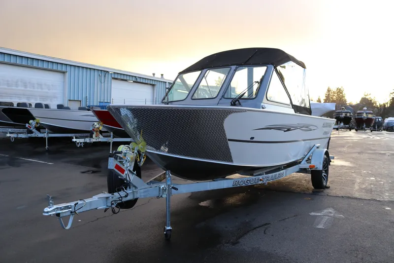 Slide: The Image of 2026 Alumaweld Stryker 202 boat on trailer in outdoor dealership lot. - 6
