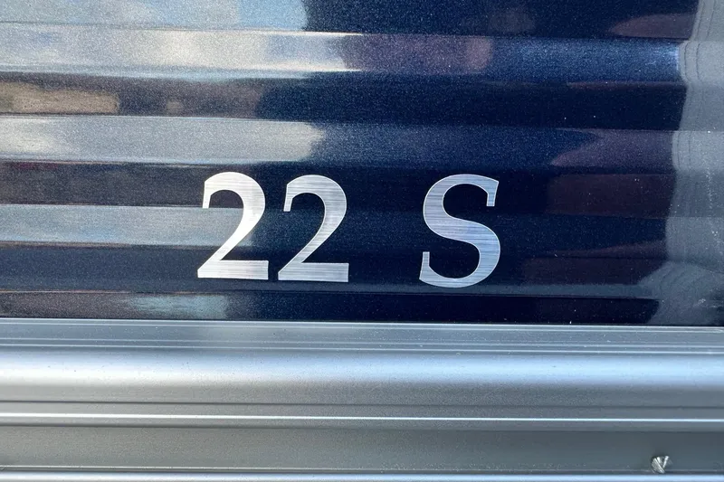 Slide: The Image of 2026 Bennington 22 SSB SwingBack boat model detail with metallic finish. - 10