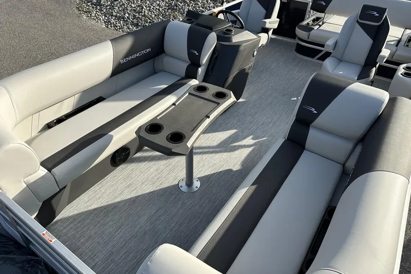 Slide: The Image of 2026 Bennington 22 SSB SwingBack interior with seating and table, featuring Yamaha 90 Hp engine. - 14