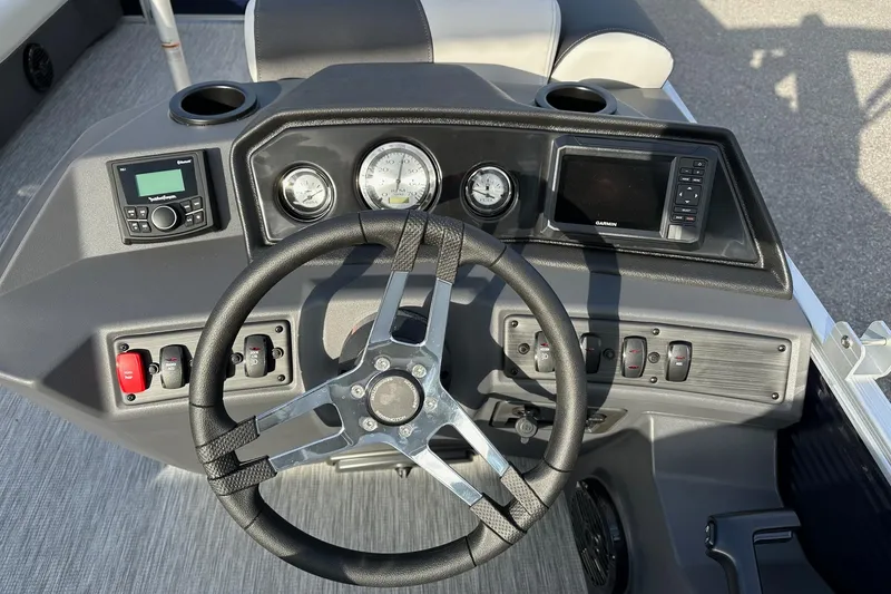 Slide: The Image of Steering console of 2026 Bennington 22 SSB with Yamaha 90 Hp, featuring modern controls and gauges. - 16
