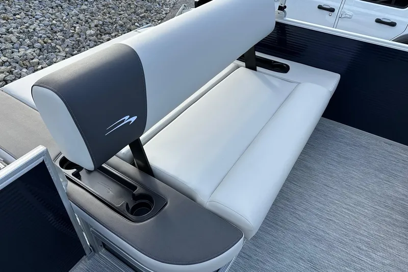 Slide: The Image of 2026 Bennington 22 SSB SwingBack boat seat with cup holders, featuring sleek design. - 19