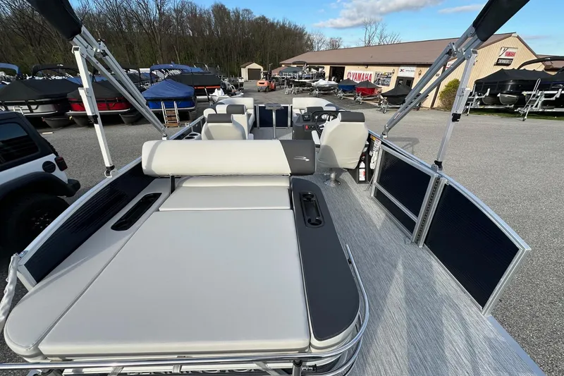 Slide: The Image of 2026 Bennington 22 SSB SwingBack pontoon boat with Yamaha 90 Hp, in stock, outdoor display. - 23
