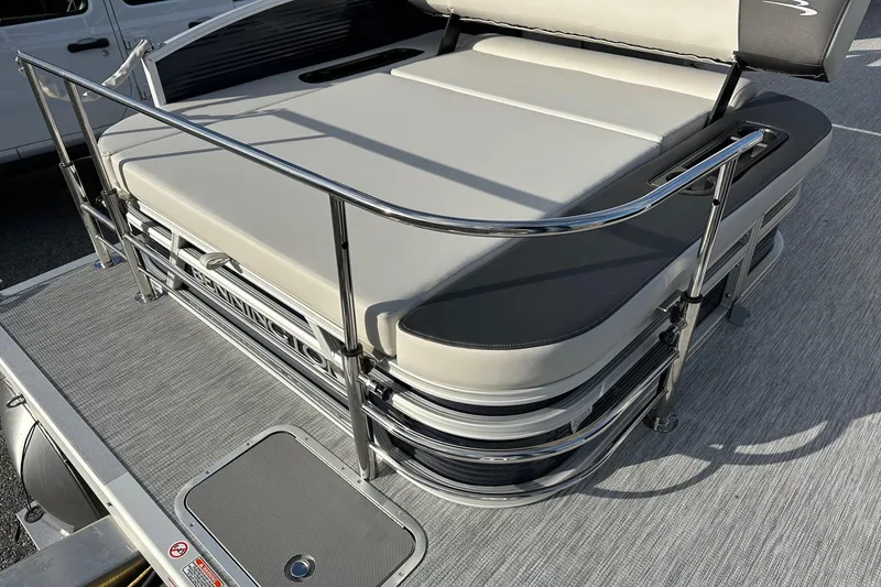 Slide: The Image of 2026 Bennington 22 SSB SwingBack boat with Yamaha 90 Hp, featuring sleek seating and railing. - 24