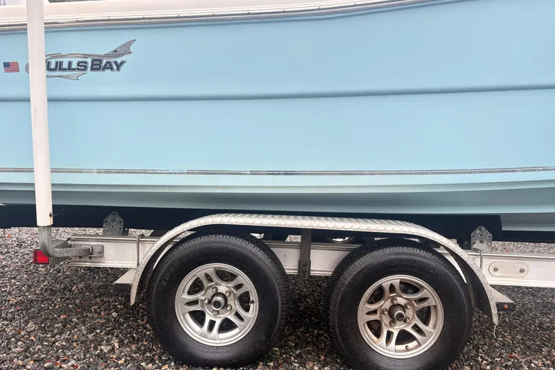 Slide: The Image of 2022 Bulls Bay 230 Center Console boat on trailer, side view. - 3