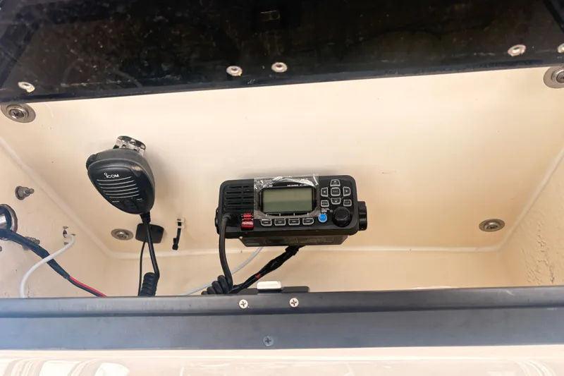 Slide: The Image of VHF radio and microphone in Bulls Bay 230 Center Console, 2022 model. - 8
