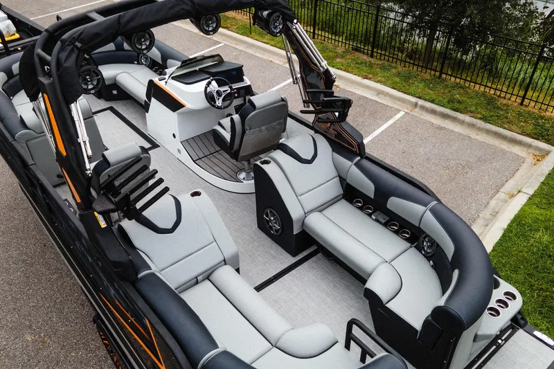 Slide: The Image of 2024 Montara 23 Surf Boss 2.0 CW boat interior with sleek seating and modern design. - 6