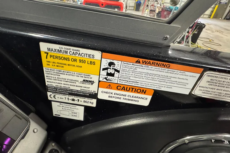 Slide: The Image of 2021 Ranger 1880MS boat capacity and safety warning labels, including carbon monoxide caution. - 11