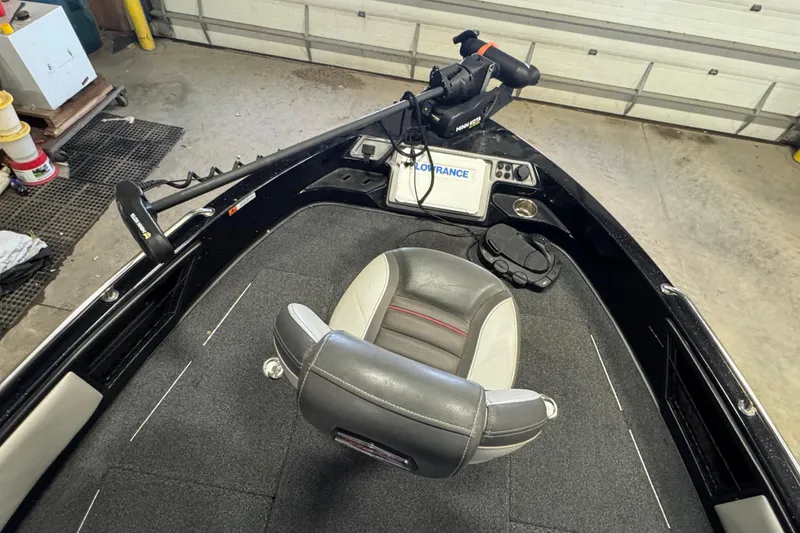 Slide: The Image of 2021 Ranger 1880MS boat interior with Lowrance system and Minn Kota trolling motor. - 13