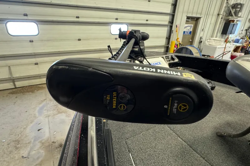 Slide: The Image of Minn Kota Ulterra motor on 2021 Ranger 1880MS boat in a garage setting. - 14
