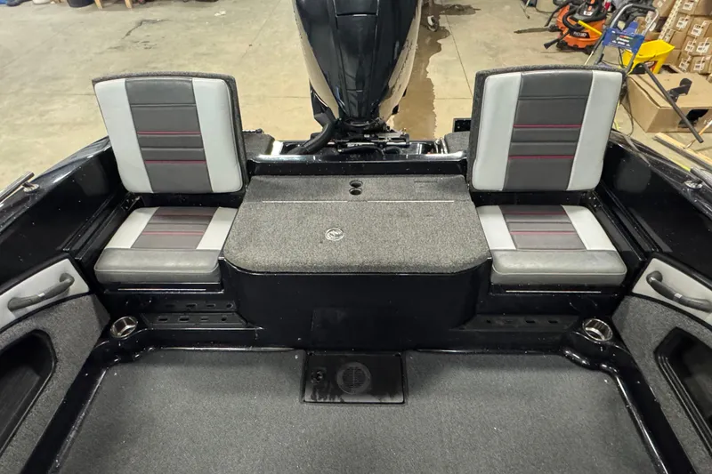 Slide: The Image of 2021 Ranger 1880MS boat interior with gray and black seating, spacious layout. - 7