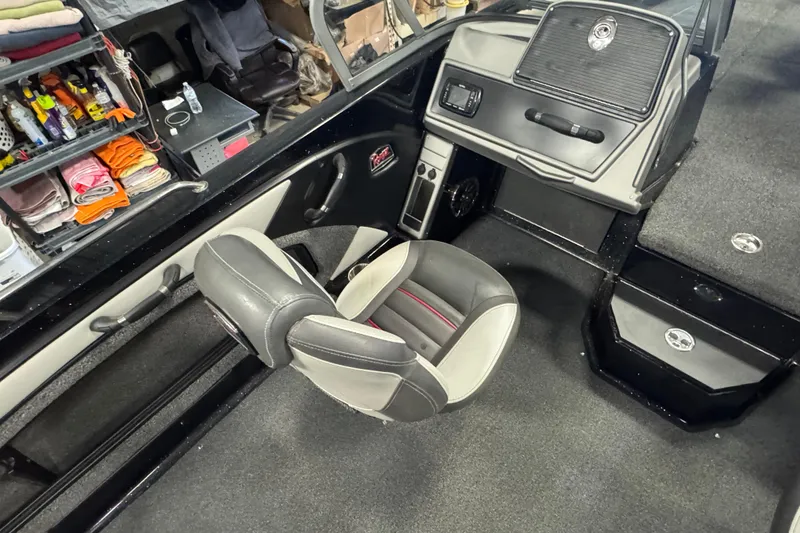 Slide: The Image of Interior of a 2021 Ranger 1880MS boat with seating and dashboard. - 9