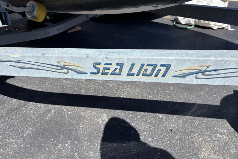 Slide: The Image of Trailer with "Sea Lion" branding for a 2009 Monterey 214FS boat. - 20