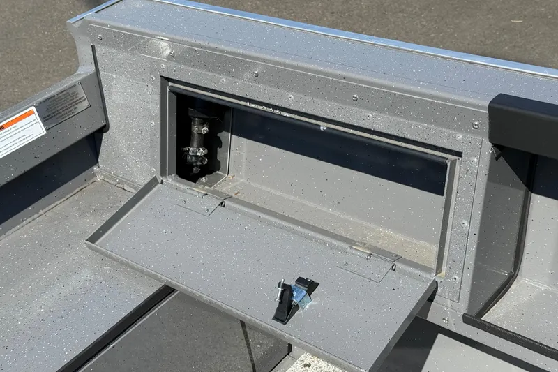 Slide: The Image of 2025 Alumaweld Free Drifter 20 boat compartment with open hatch, showcasing interior details. - 32