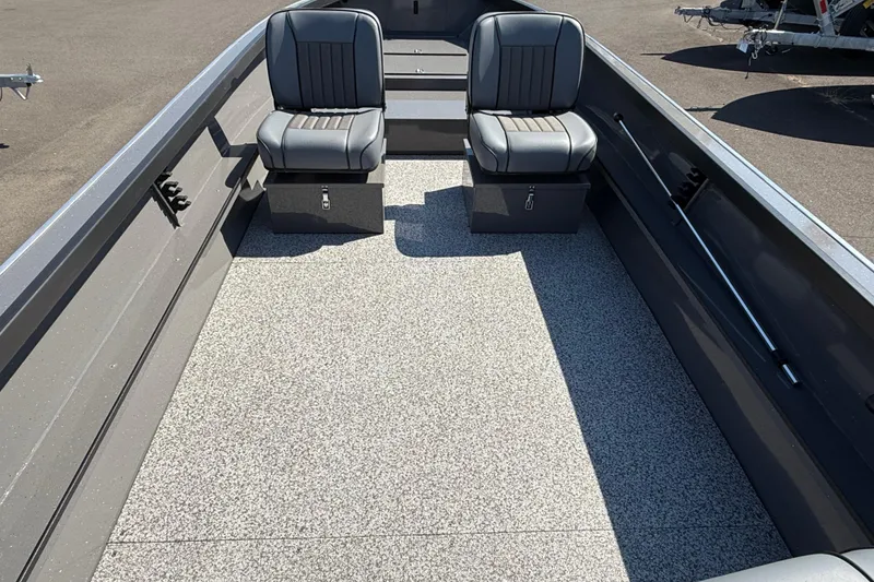 Slide: The Image of 2025 Alumaweld Free Drifter 20 interior with two gray seats and spacious deck. - 19