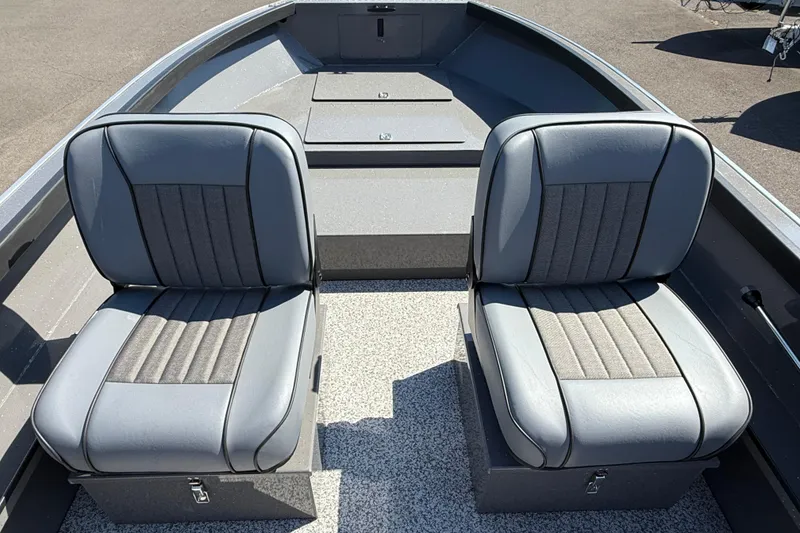 Slide: The Image of 2025 Alumaweld Free Drifter 20 boat interior with two gray seats. - 20