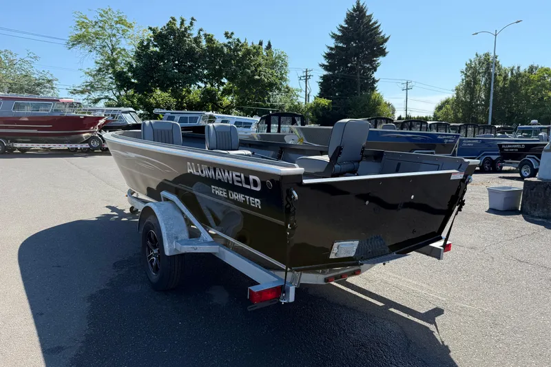 Slide: The Image of 2025 Alumaweld Free Drifter 20 boat on trailer in outdoor lot. - 6