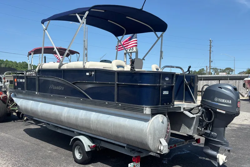 The Image of 2015 Manitou 20 Oasis Angler pontoon boat with Yamaha motor and canopy. - 7
