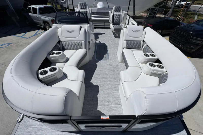 Slide: The Image of 2026 Bennington 22 LXS Swingback pontoon boat with luxurious seating and cup holders. - 17