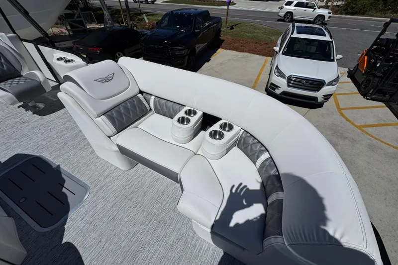 Slide: The Image of Luxurious seating on 2026 Bennington 22 LXS Swingback pontoon boat with cup holders. - 20