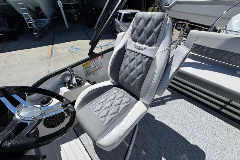 Slide: The Image of Captain's chair on 2026 Bennington 22 LXS Swingback boat, featuring sleek design and premium materials. - 26