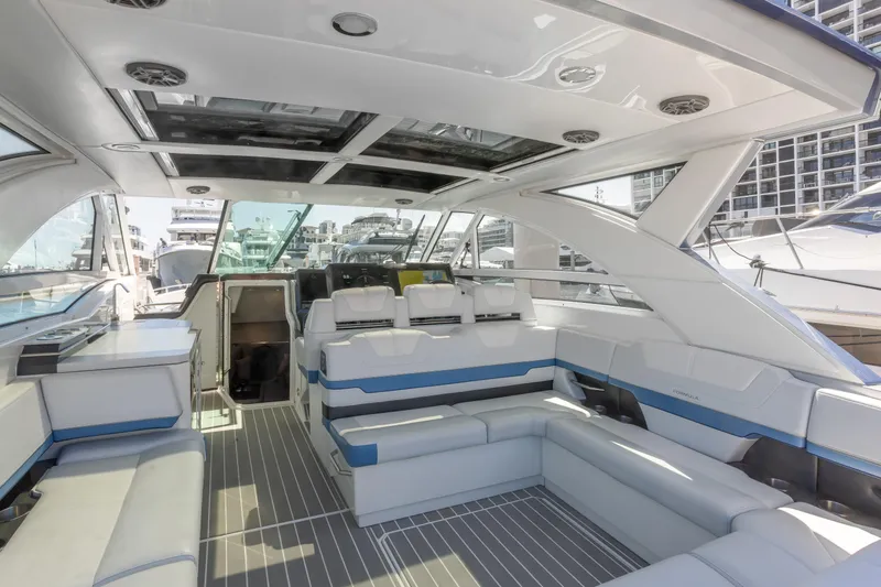 Slide: The Image of Luxurious interior of 2023 Formula 430 Super Sport Crossover yacht, featuring spacious seating and modern design. - 14