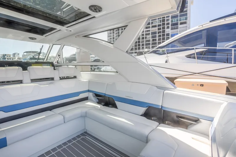 Slide: The Image of Luxurious interior of 2023 Formula 430 Super Sport Crossover yacht with modern seating and panoramic windows. - 15
